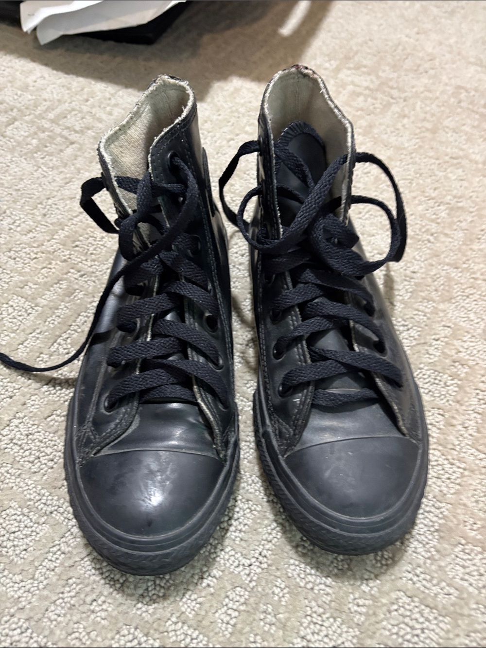 All black leather CONVERSE high tops